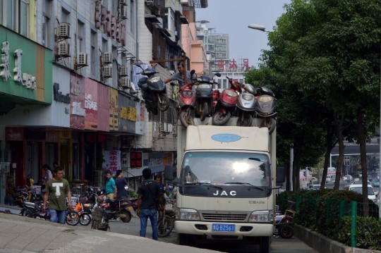 Loading Bikes on a Truck in Wuhan
