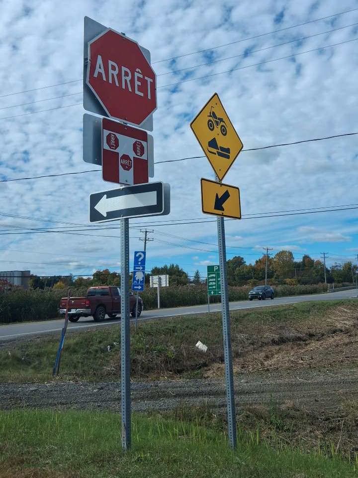 Snowmobile crossing warning sign on the way to Montreal — Oct. 3, 2026, Quebec, Canada