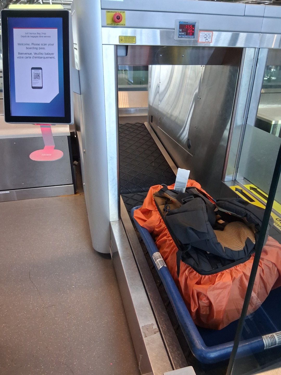 My backpack at the self-service baggage drop — Oct. 17, 2026, Ottawa Macdonald-Cartier International Airport, Ottawa, Ontario, Canada