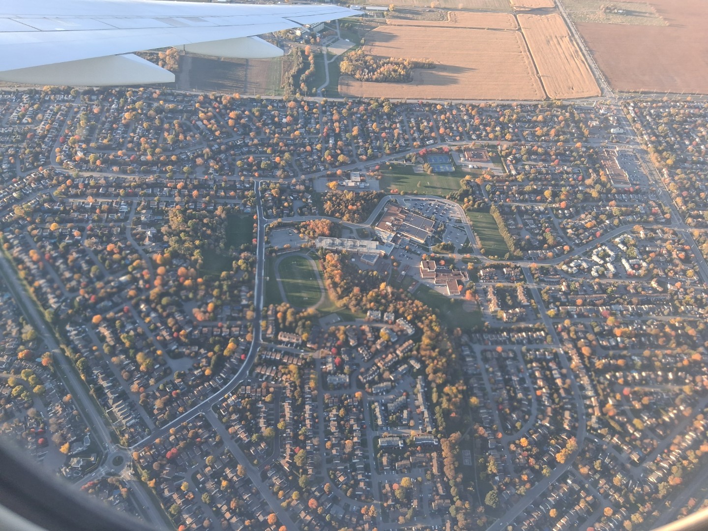 Residential neighbourhoods and a school campus with an athletics track — Oct. 17, 2026, Barrhaven, Ottawa, Ontario, Canada
