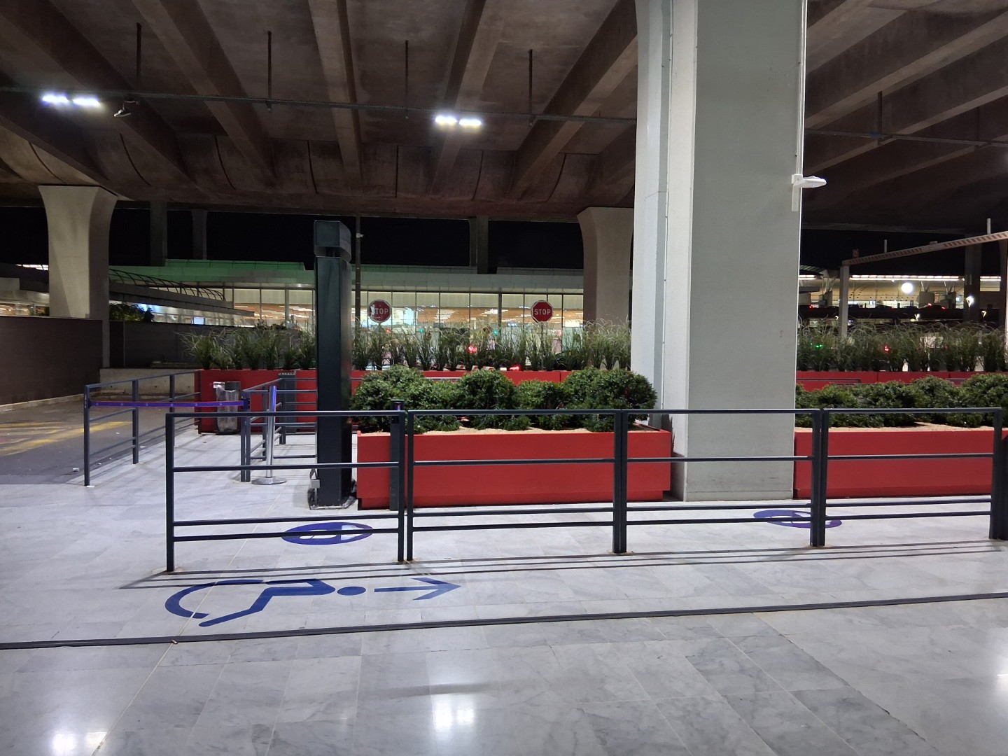 Outside Terminal 2E before sunrise — Oct. 18, 2026, Roissy-en-France, France