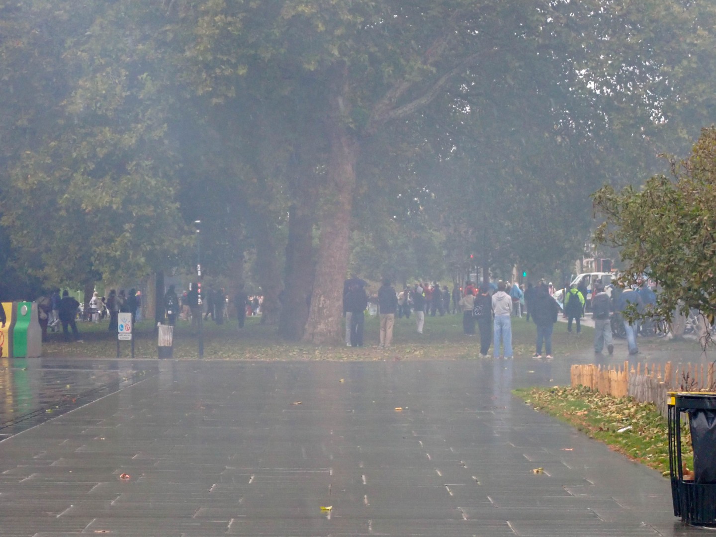 Tear gas hanging over protesters gathered under the trees — Oct. 24, 2026, Square Élisa-Mercœur, Nantes, Pays de la Loire, France
