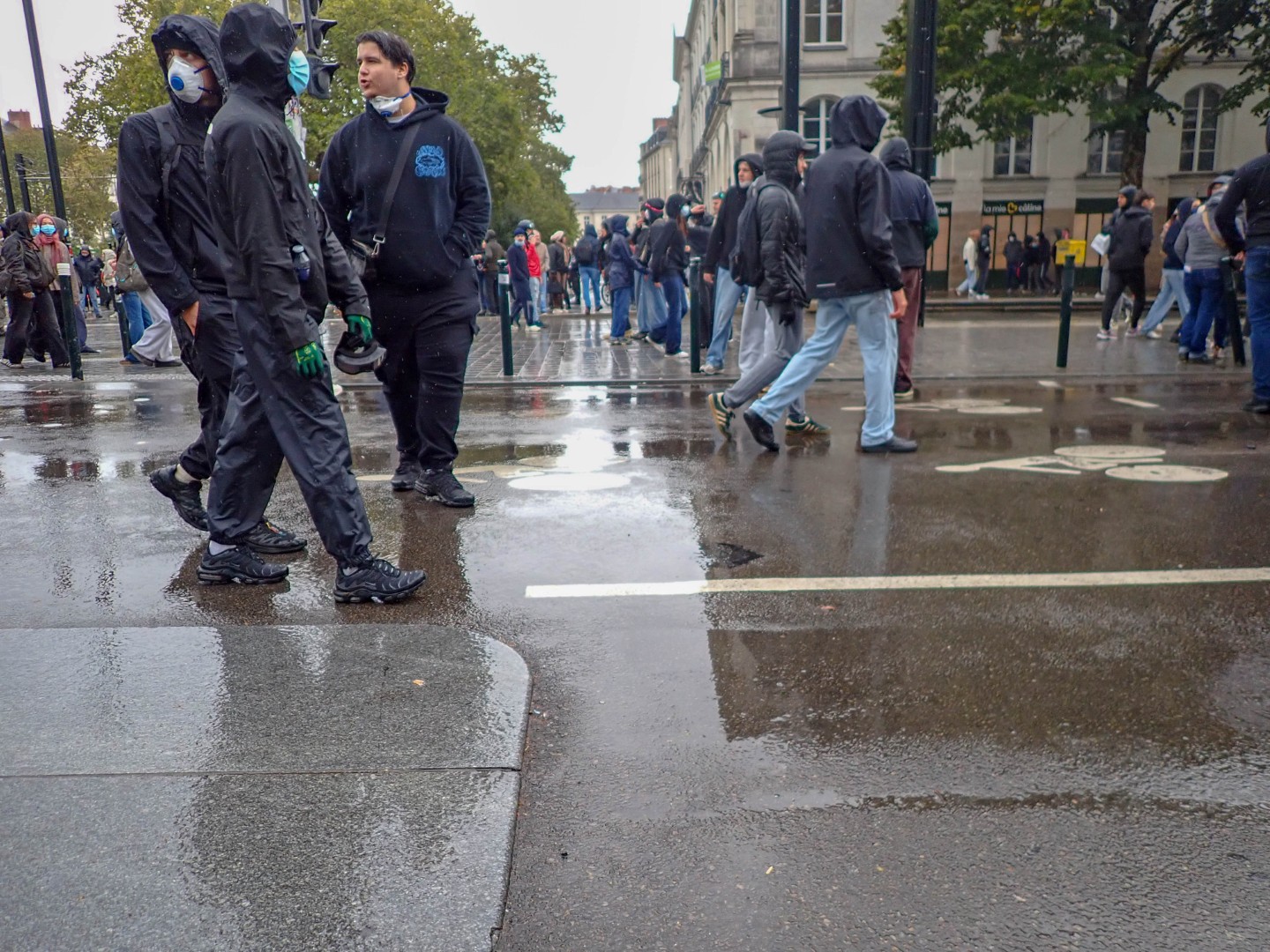 Protesters with face masks and respirators — Oct. 24, 2026, Cours des 50 Otages, Nantes, Pays de la Loire, France